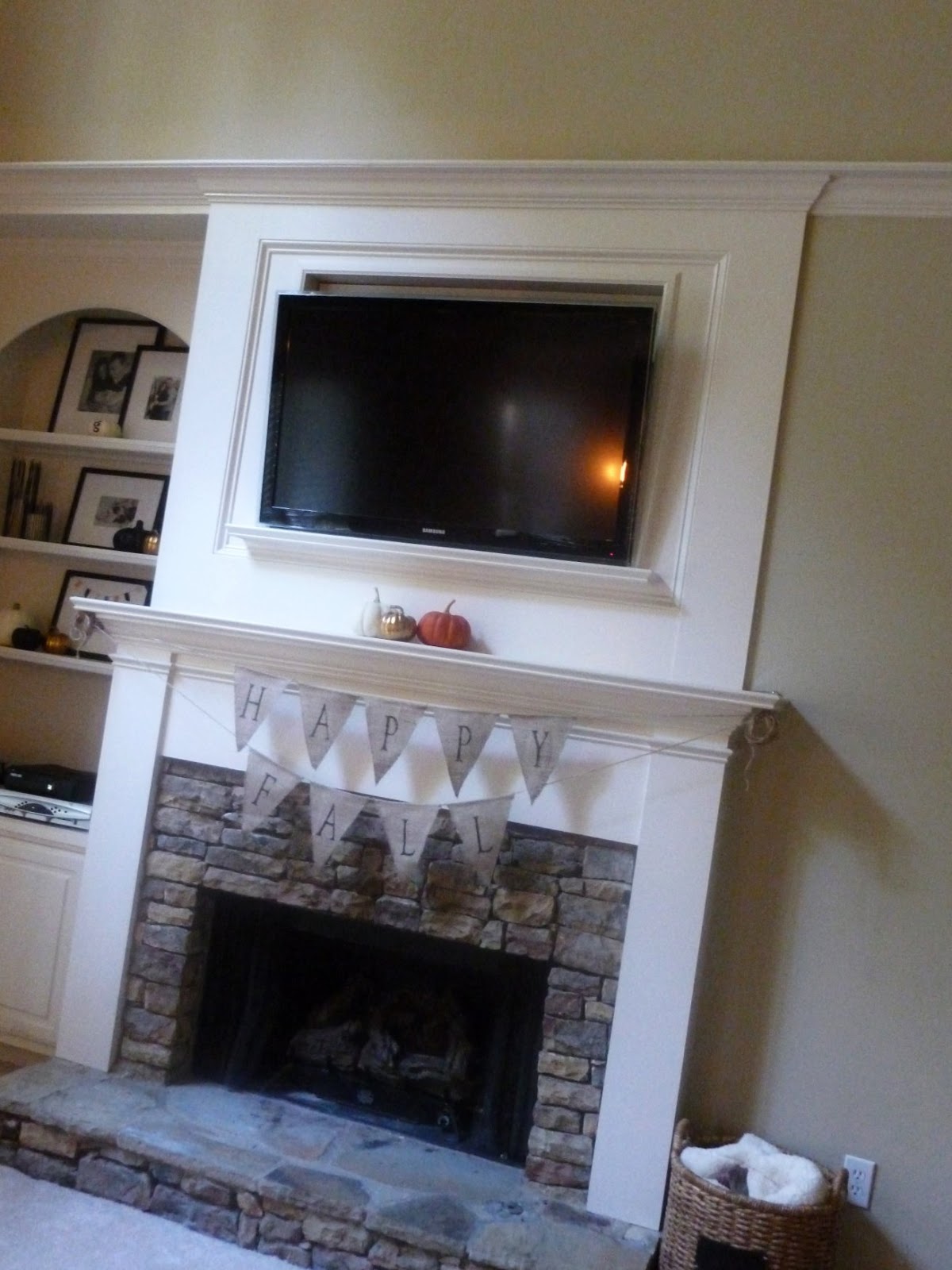 brick with wood trim fireplace
