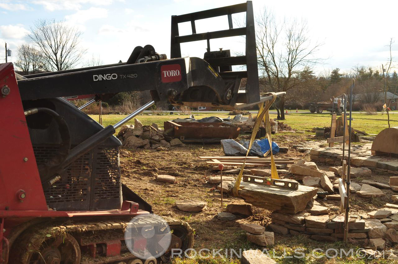 ROCKIN WALLS Equipment "Dingo" Walk Behind Mini Skid Steer