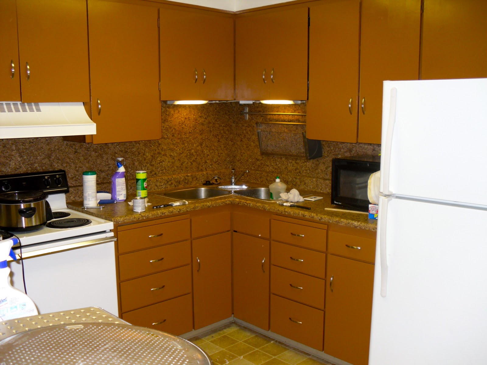 Repainting painted kitchen cabinets Old Apartment Kitchen Upgrades