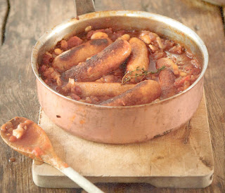 Chilli Sausage and Beer Cassoulet in a rustic pan.