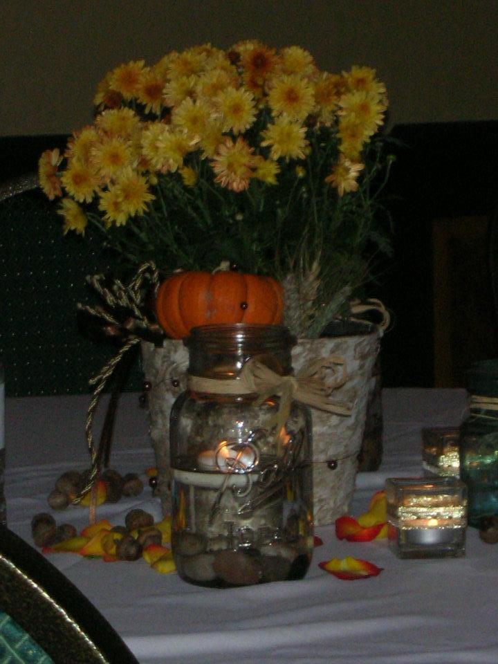 You can see in front of this short centerpiece my mason jar candle