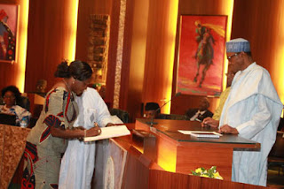 President Buhari swore in new INEC Chairman and Commissioners