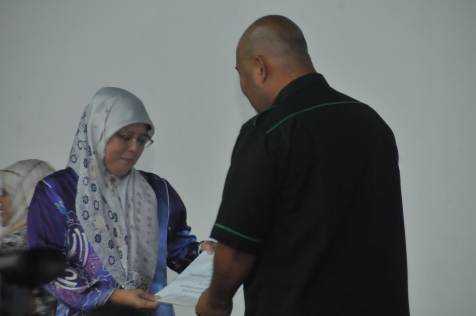 Handing Over Donations for OBK