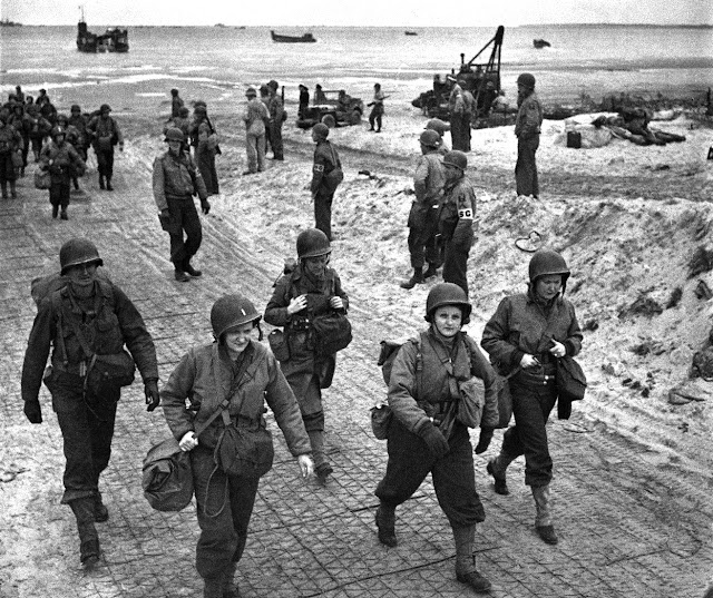 American nurses land on the Normandy beach in July 1944