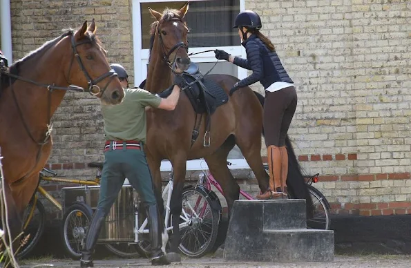 Crown Princess Mary and Crown Prince Frederik of Denmark at Gråsten Palace on horseback