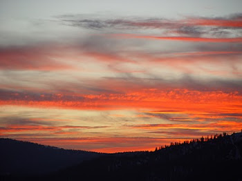 SUNSET OVER CAL NEVA RIDGE FROM BURNT CEDAR BEACH