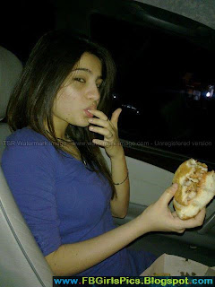 Girl eating Burger in car