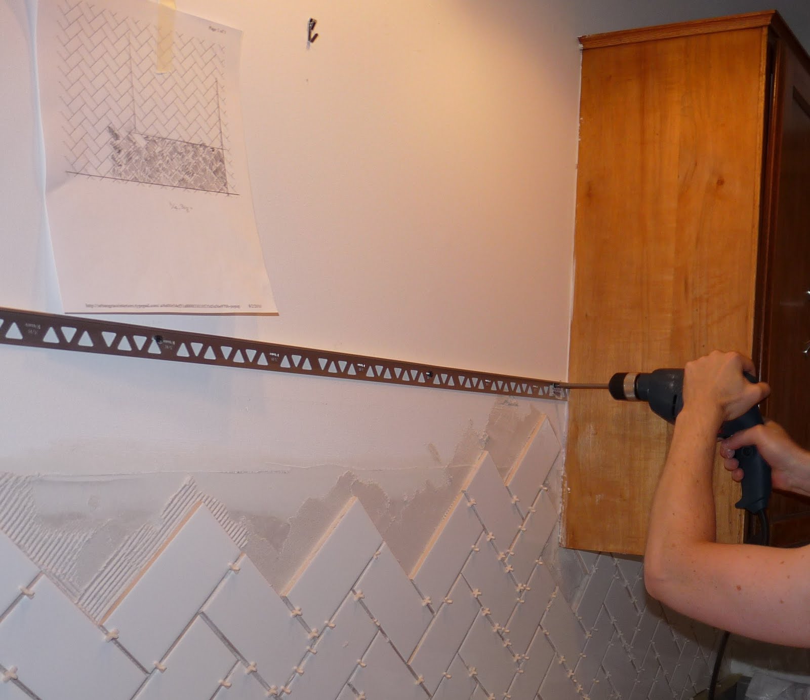 Finishing Tile With Metal Edging | Dans le Lakehouse