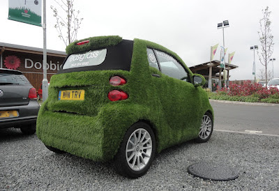 EasiBug by EasiGrass grass-covered SMART car in Dobbies' car park in Lisburn