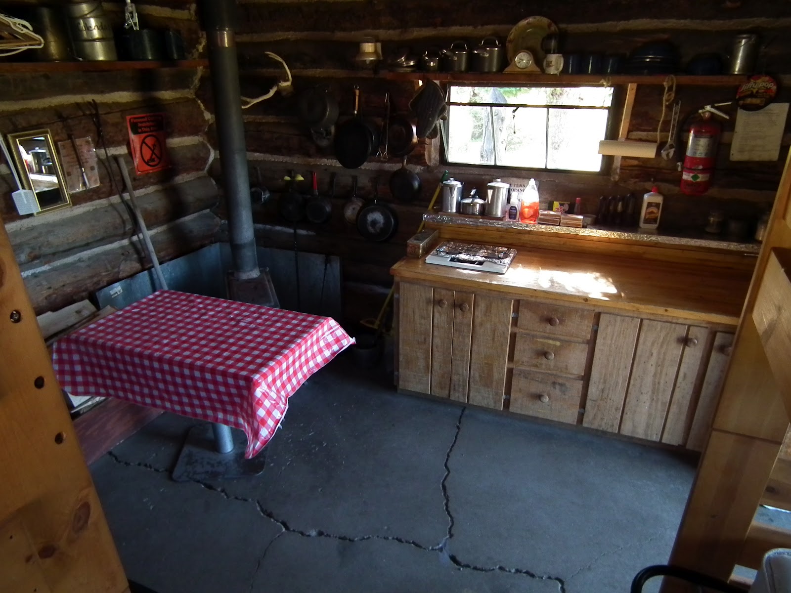 Elwood Cabin Features A Good Wood Stove For Heat And Propane Lights Two Burner Counter Top Range Cooking Visitors Must Haul In Their Own Water