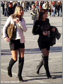 Girls walking in high heels on the street