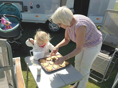 Tin Box Tot decorating cakes with grandma