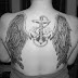 gives a realistic look to the angel wings in the back tattoo design