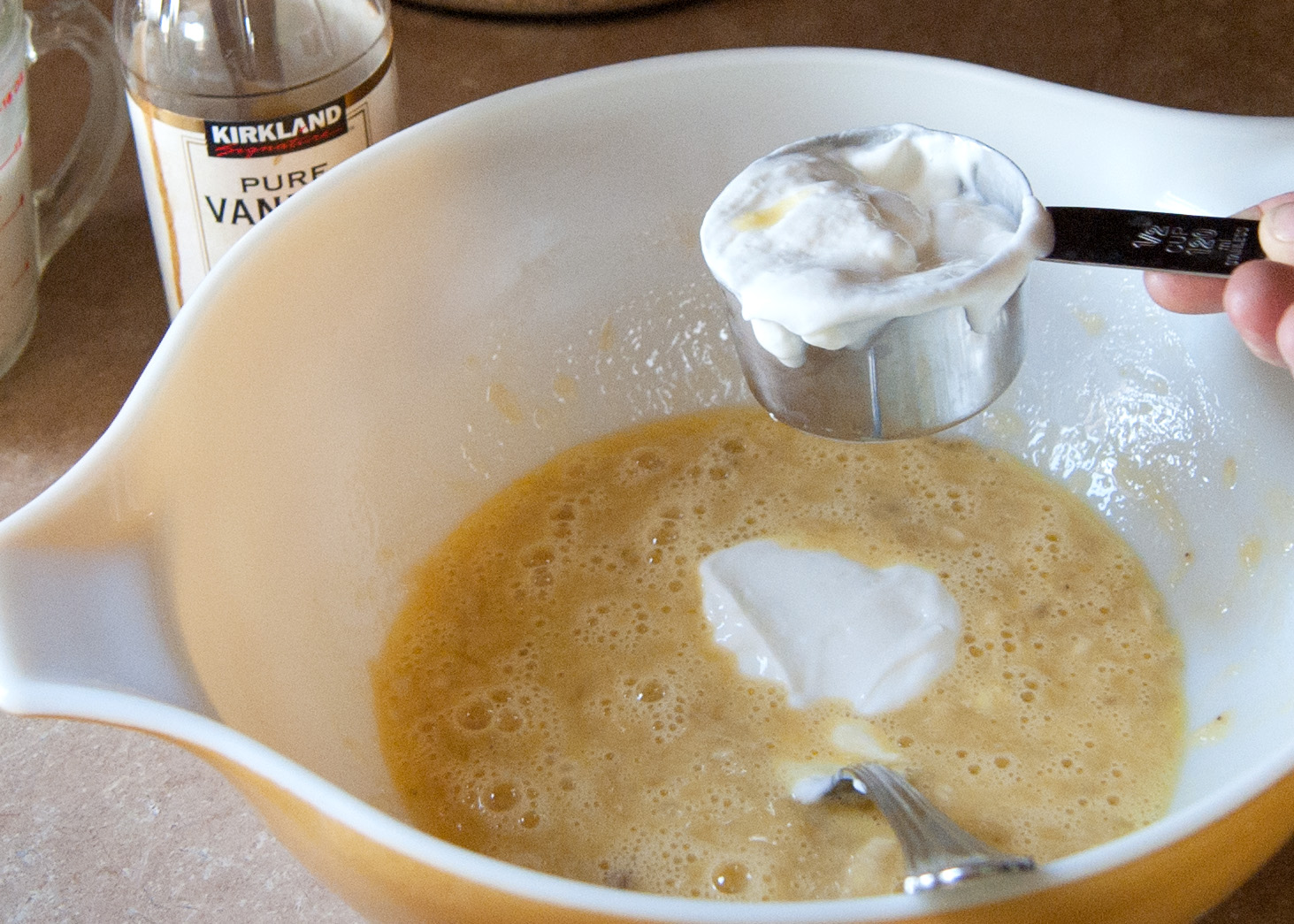 Step 2:  Add your 2 eggs and your 1/2 cup of Plain Greek Yogurt and Vanilla - mix to incorporate.