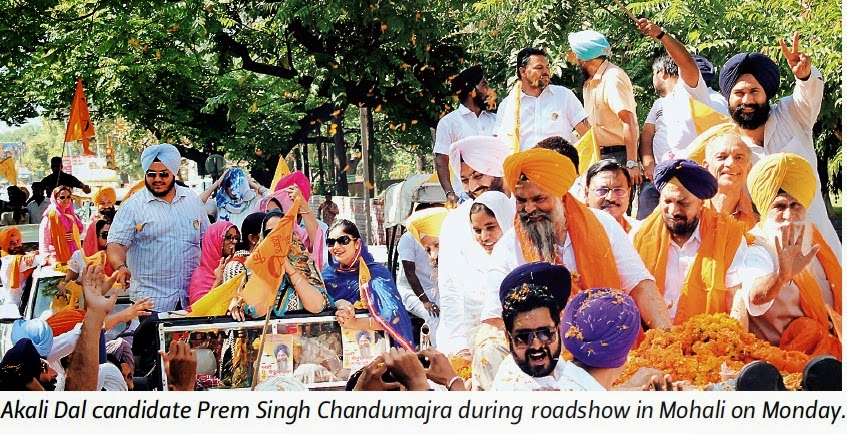Akali Dal candidate Prem Singh Chandumajra, with Ex-MP Satya Pal Jain & other leaders, during his roadshow in Mohali on Monday.
