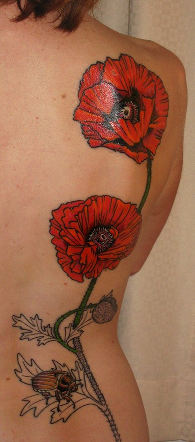 Tribal flower tattoo on full back 