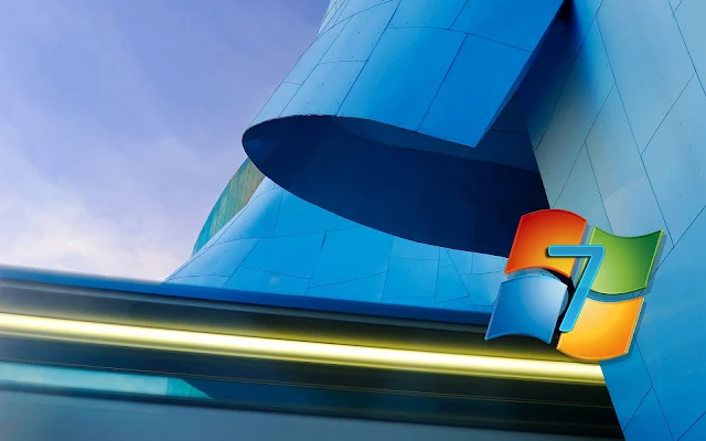 Blauwe Windows 7 achtergrond met logo en 3D gebouw