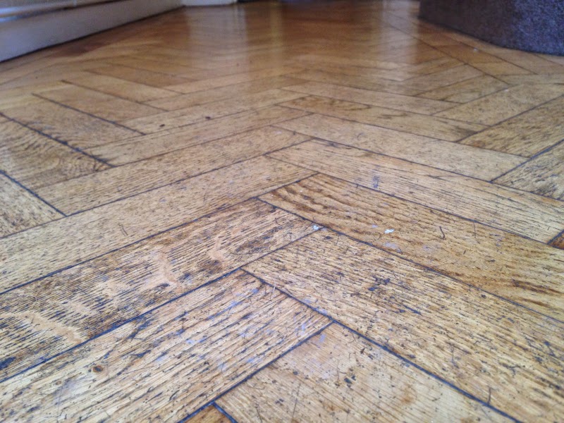See the transforamation of this parquet entrance floor in these photos