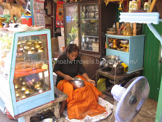 a woman sitting in a store