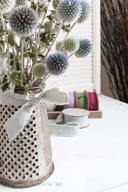 Make an antique grater flower vase instantly! By Keeping With The Times, featured on http://www.ilovethatjunk.com