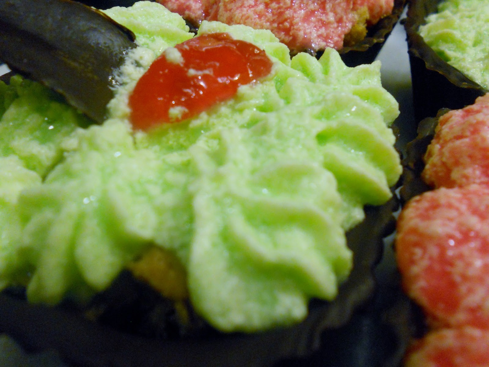 Kunzle Cakes but vegan cupcakes in a chocolate shell