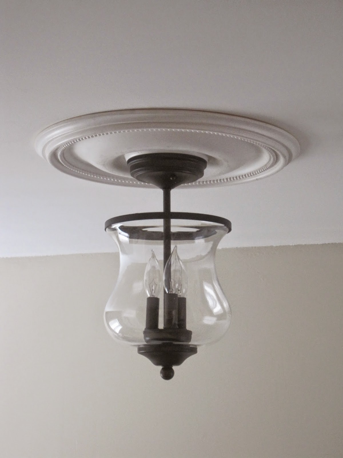 Decorated Chaos New Light Fixture in the Mudroom