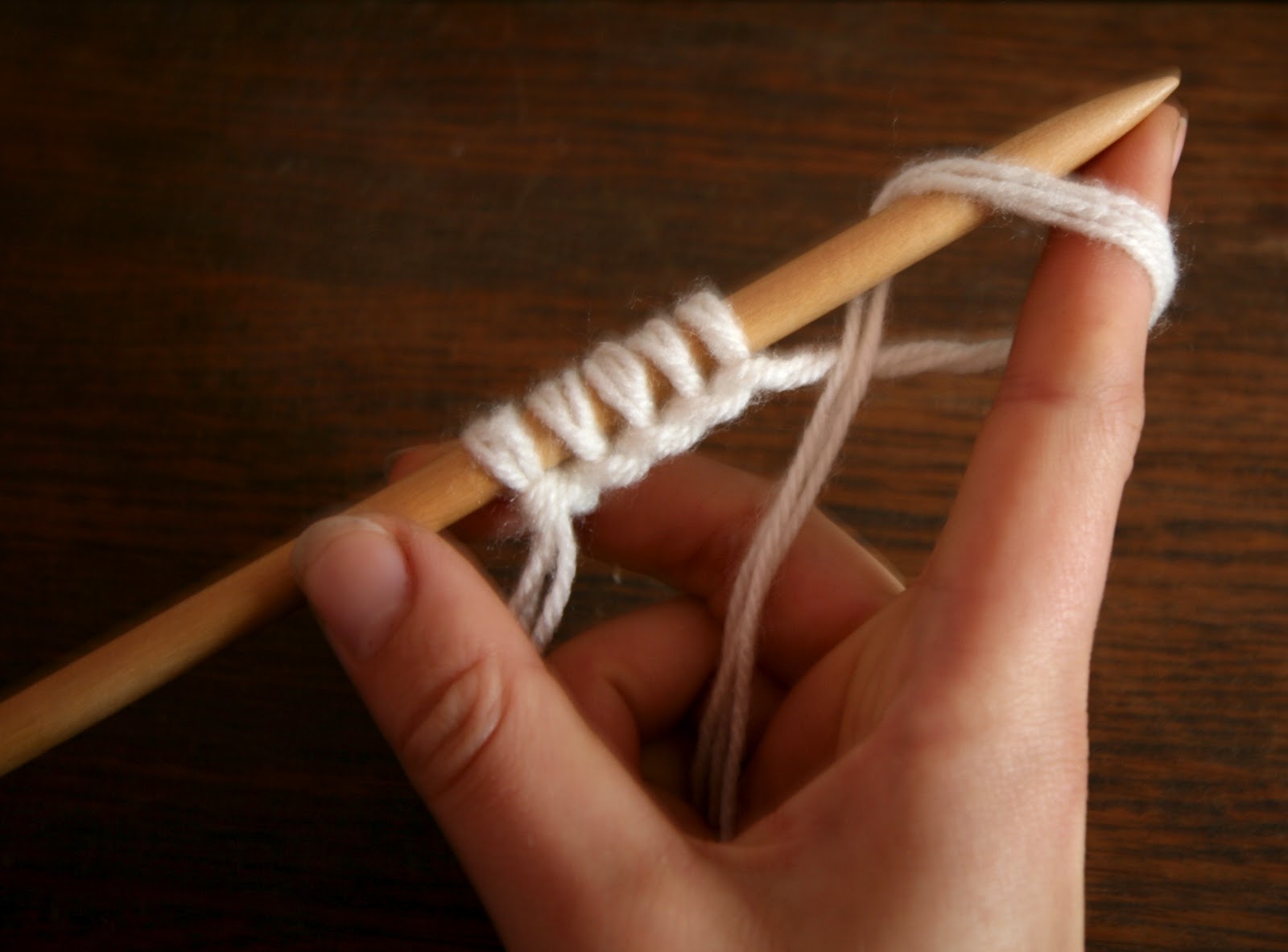 Squish! I used Scarfie yarn, and the Navajo triple strand method
