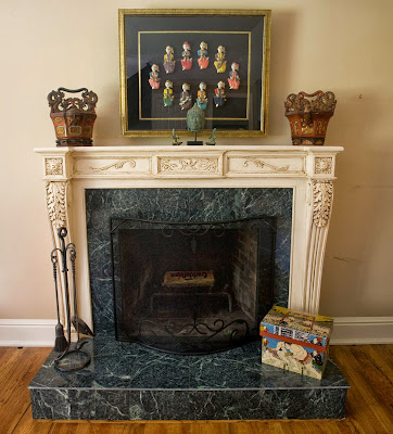 closer look to the antique fireplace closer look to the fireplace reveal antique pieces, marble materials and beautiful carved design