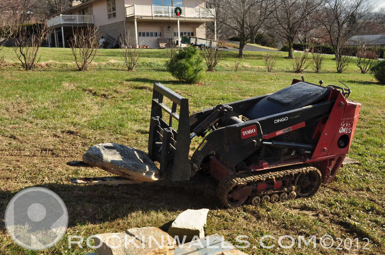 ROCKIN WALLS Equipment "Dingo" Walk Behind Mini Skid Steer
