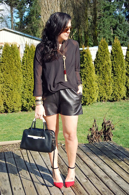 Topshop leather shorts, Helmut Lang Lyra Twist top and a Furla Diamante bag