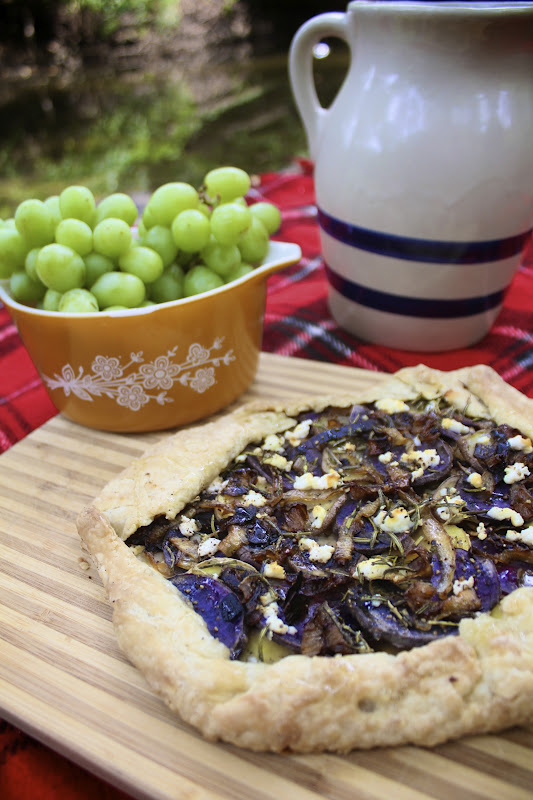 Nothing in the House Tricolor Potato, Caramelized Onion, Goat Cheese