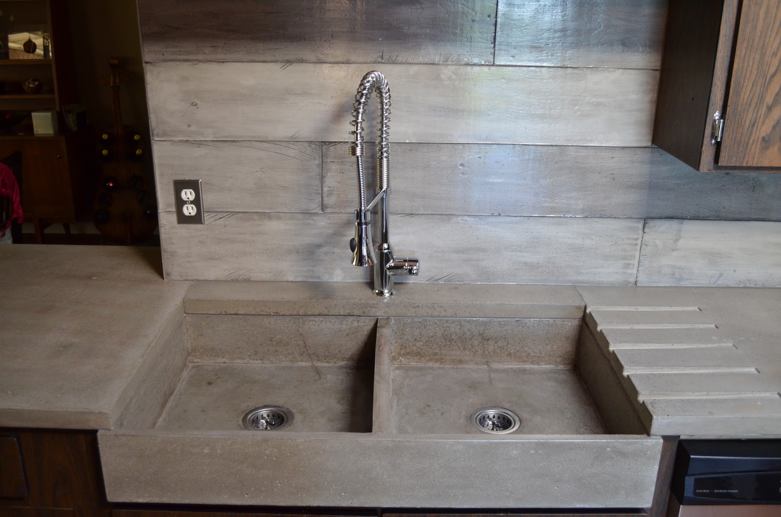 This modern, double farm-style, apron concrete sink is massive in size ...