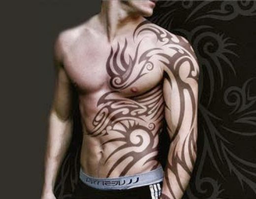 tribal tattoos for arms in men. tribal tattoos for men on arm.
