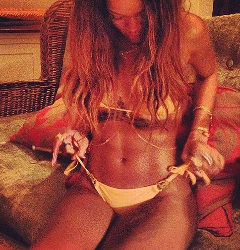 Rihanna taking off her yellow panties