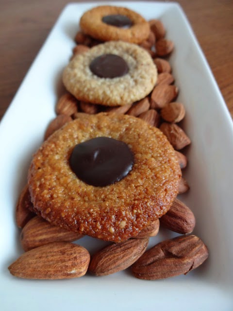 http://www.bakingandmistaking.com/2013/03/almont-chocolate-thumbprint-cookies.html