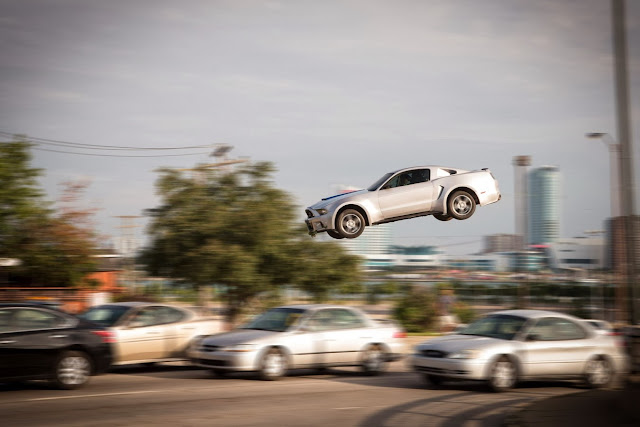 ford mustang in the air - Need for speed movie still