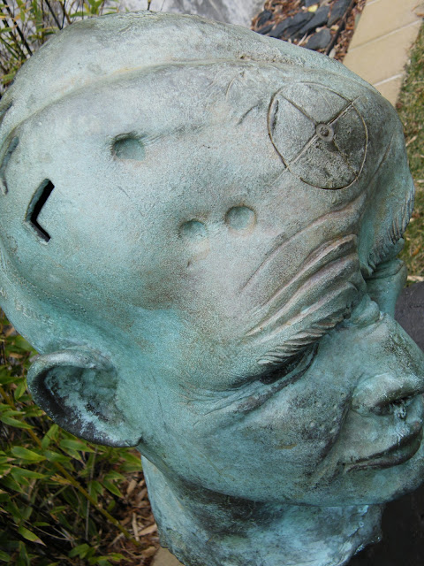 Bronze head in the Barbro Osher Sculpture Garden - de Young San Francisco
