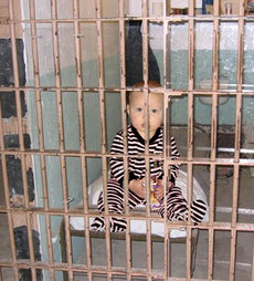 jail kid little prison bars children law year old behind boy henry paul jeana court adult gingerich york