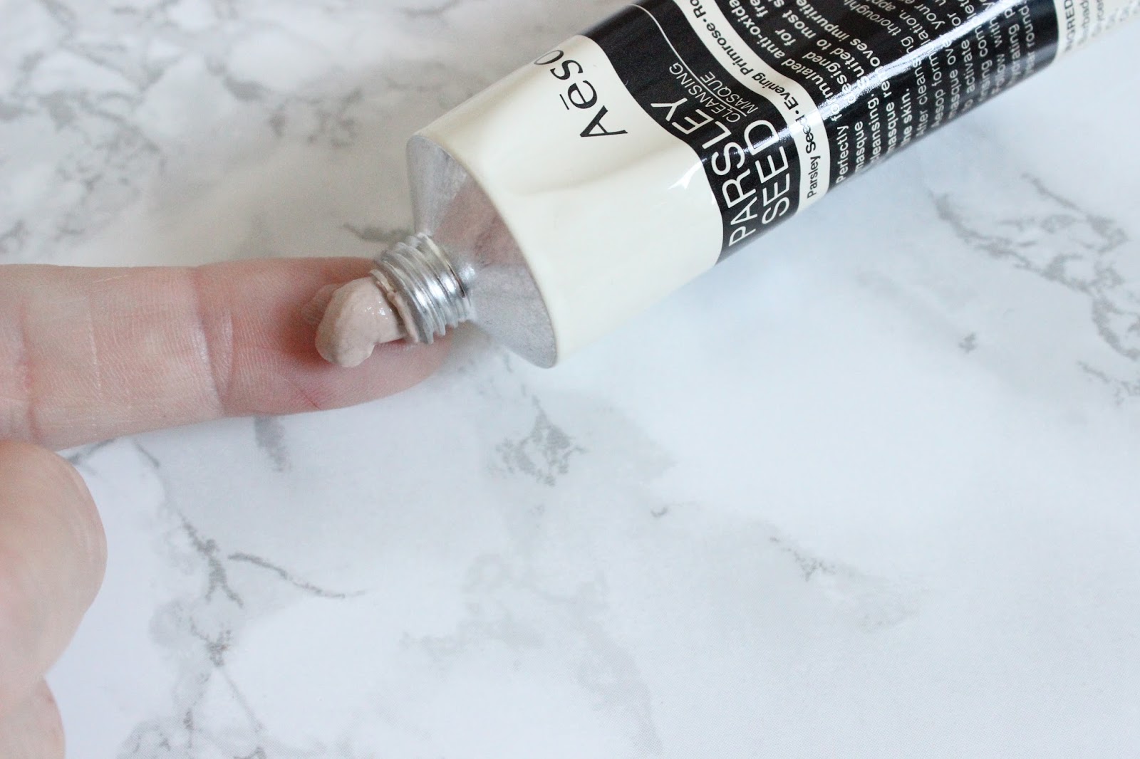 Aesop Parsley Seed Cleansing Masque a little pop of coral.