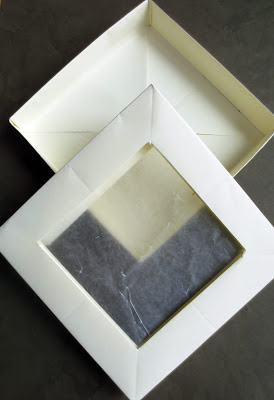 handmade paper box with wax paper window