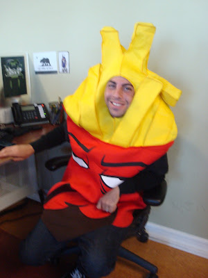 halloween 2011 at gotprint employee wearing fries costume at desk