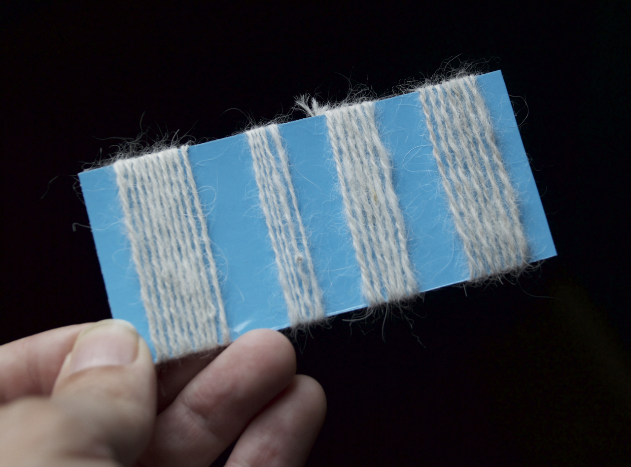 Stitchin' Bints Spinning Samoyed dog fur into yarn