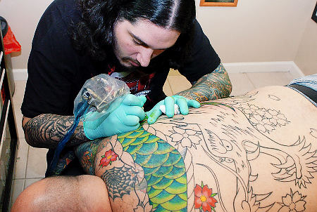 tattoo artist A tattoo artist has the task to put on the skin indelibly a 