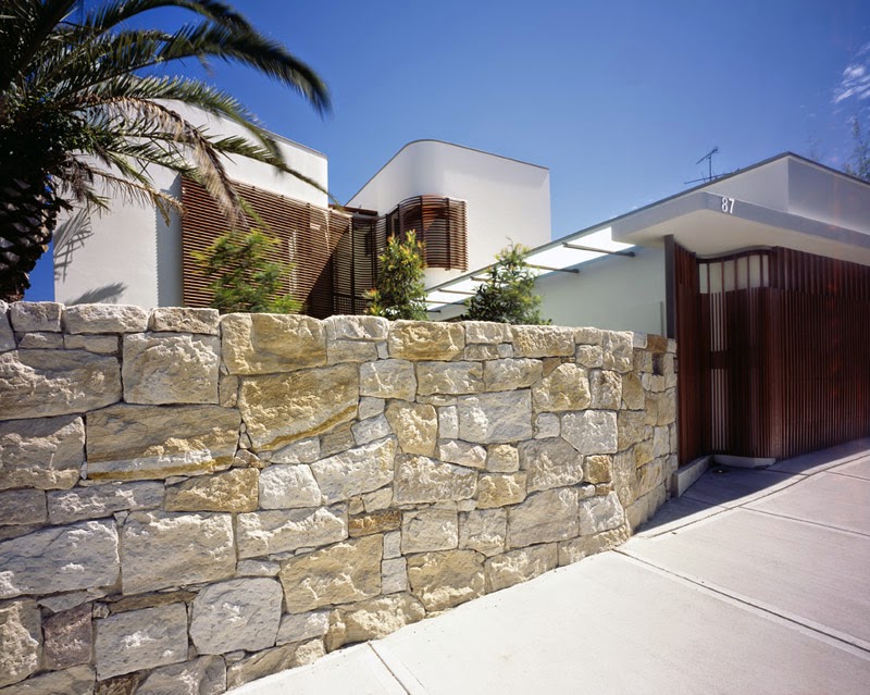 desain pagar batu alam rumah minimalis