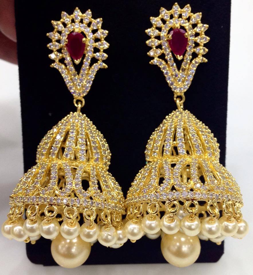 Exclusive Large Cz Jumkas Online Earrings Elegantfahionwear In The Crowd Wearing This Pair Of Golden Cz Stone And Ruby Jumkas These Are Durable Skin Friendly Wear Earrings With A Matching Saree
