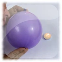 Soplar la vela a través de un objeto solido
