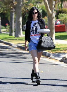 Rumer Willis walking down the street in Beverly Hills with the leftovers from lunch