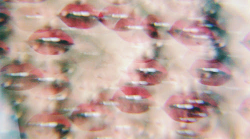 Movie still of red lips from Alexandrea Anissa collaboration with Hana Haley