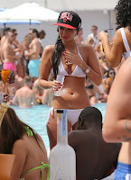 Tulisa Contostavlos partying in Marbella wearing a white bikini and Bulls hat