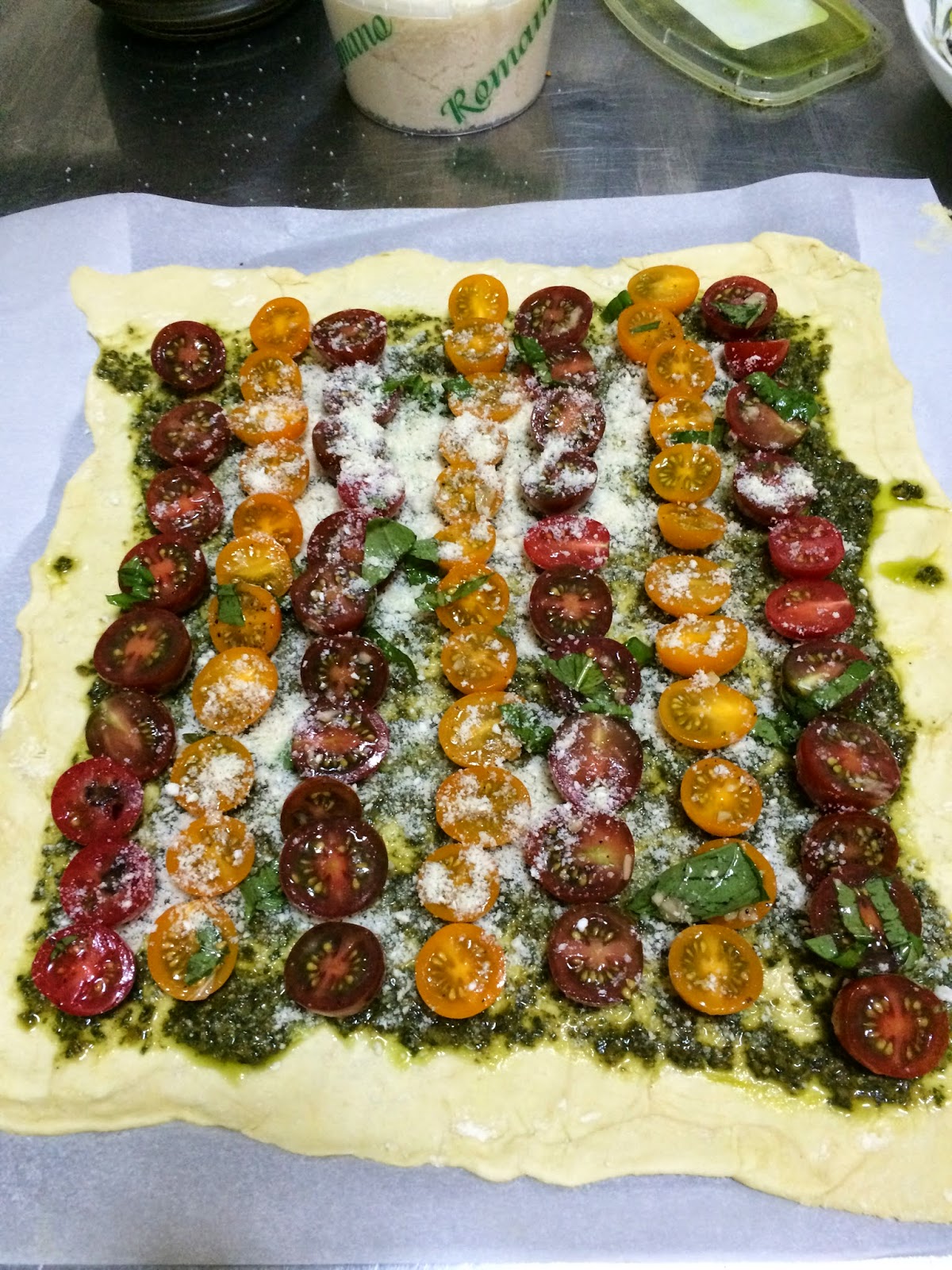 Olive Oil, Onions, and Garlic Cherry Tomato, Goat Cheese and Pesto Tart